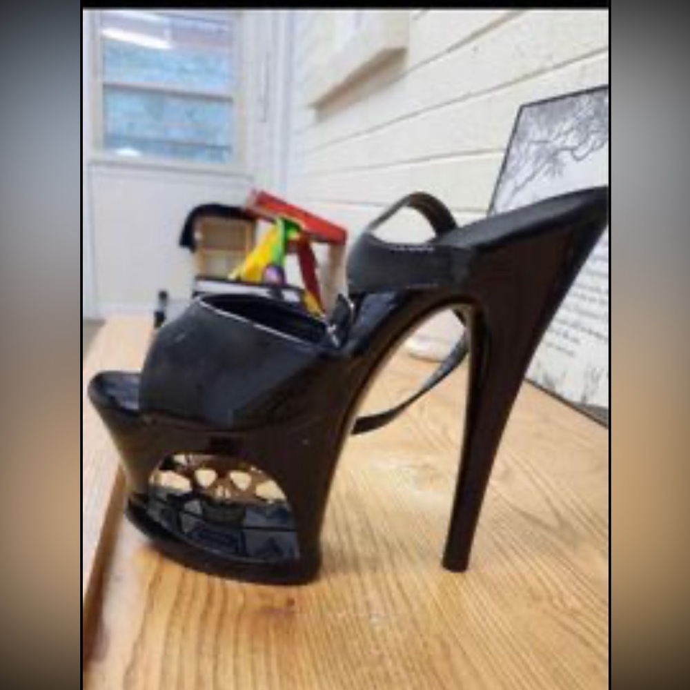 4 Pair of Pleasure high heels.